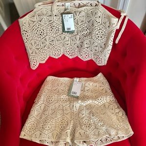 Brand new H&M crochet shorts set w/tags. Top is a medium, shorts are a small.